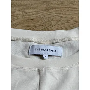 EUC Womens The Noli Shop modal cream short sleeve‎ tshirt front seam size M thumbnail 2
