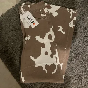 12th Tribe Women’s Cow Print Brown & White Jeans- 48% Off and ! thumbnail 3