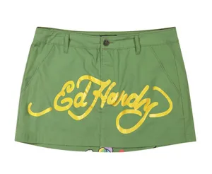 Ed Hardy nwt Vintage mini skirt with "love kills slowly" graphic and gold logo thumbnail 1