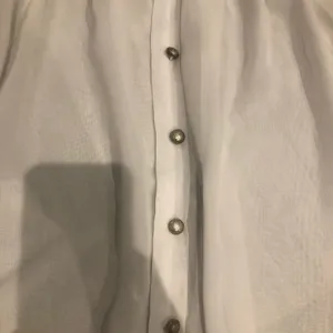 Urvana Plain Solid White Kind of Crop Top Ties in front on‎ bottom 3/4 Sleeves thumbnail 4