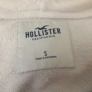 White hollishter jacket thumbnail 3