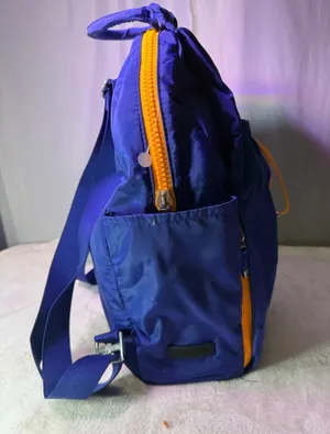Baggallini Royal Blue Nylon Drawstring Backpack with Yellow Accent thumbnail 1