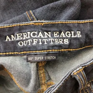 American Eagle Medium Wash Denim Shorts Raw Hem Mid Rise Jean Shorts 6 thumbnail 9