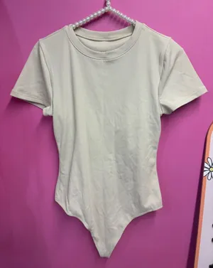 Girlfriend Collective Cream Ribbed Short-Sleeve Bodysuit thumbnail 1