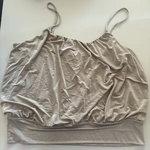 Express Tan and cream cami top #camitop #y2kstyle #model #nyc 2000s, chic, tank top, spaghetti strap, clean girl, neutrals thumbnail 1
