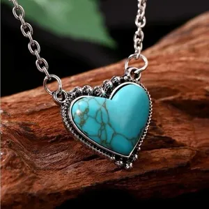 Cute cowgirl/western style silver chain with cute turquoise heart center! New thumbnail 1