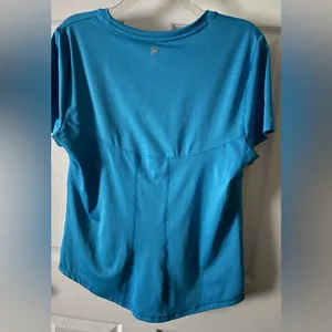 Fila Athletic Golf top Sz Large Cerulean P-P 22 L 24-25” Longer in back EUC thumbnail 2