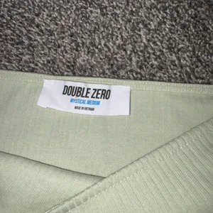 Double Zero green ribbed crop top in a M thumbnail 2