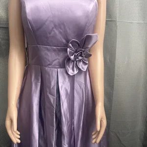 New size 14, beautiful dress has a tail in the back and a big flower in the front thumbnail 2