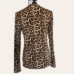 Michael Kors stretchy leopard pullover top w gold logo clasp NWOT thumbnail 2
