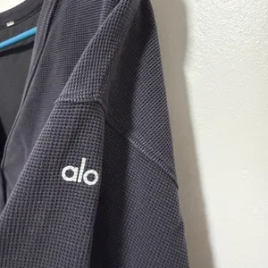 Alo Yoga Micro Waffle Pleasant Cropped Henley in Black thumbnail 3