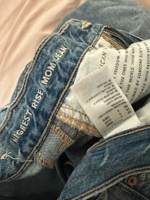 American Eagle highest rise ripped mom jean thumbnail 3