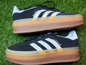 Adidas 8.5 women. Black and white. Triple stacks thumbnail 3