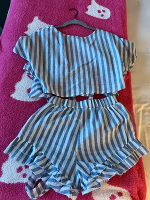 Amazon Stylish blue and white striped romper with ruffle details. Perfect for casual outings. thumbnail 3