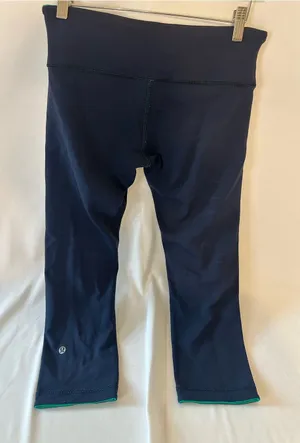 lululemon athletica Girls' Navy Capri Leggings with Teal Trim thumbnail 1