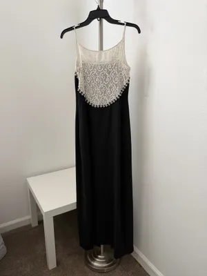 Elegant black maxi dress featuring a delicate cream lace yoke and thin straps. thumbnail 2
