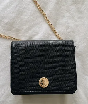 Kendall and Kylie Crossbody black hand bag with gold detailing thumbnail 1