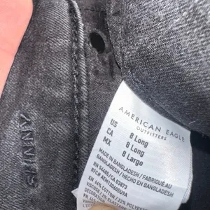 American Eagle black stretchy distressed 8 long Skinny jeans thumbnail 3
