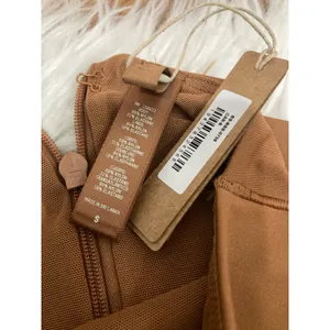 SKIMS Size Small ALL-IN-ONE LONG SLEEVE MID THIGH ONESIE CARAMEL NWT Jumpsuit thumbnail 7