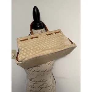 Dooney and Bourke Beige Canvas and Leather Signature Tassel Tote Handbag‎ thumbnail 2