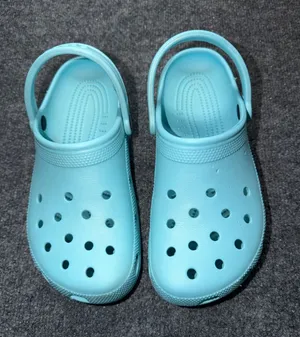 CROCS Classic Light Blue Slip-On Clogs thumbnail 1