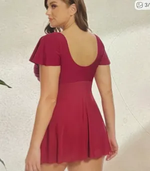 Stylish red swim dress with a flattering wrap design. Perfect for beach outings. thumbnail 4