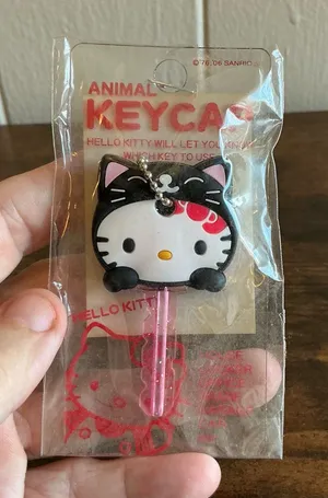 A Vintage NWT 2006 Sanrio Hello Kitty Black Cat Animal Keycap Cover thumbnail 1