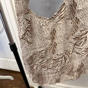 Kimchi Blue Urban Outfitters Animal Print Mini Dress Open Back Bow NWOT thumbnail 6