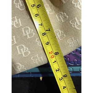 Dooney and Bourke Beige Canvas and Leather Signature Tassel Tote Handbag‎ thumbnail 9