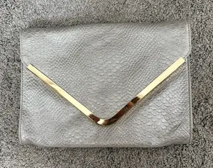 Guess Silver Clutch with Gold Detail and Removable Strap 💜 thumbnail 1