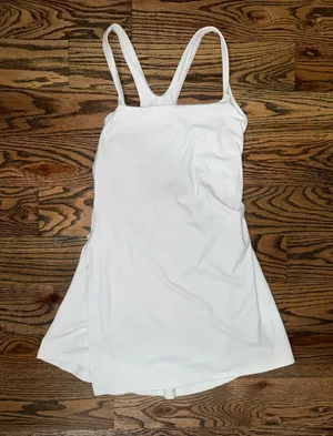 White athletic dress.  thumbnail 1