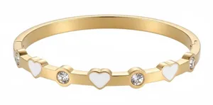 This chic bracelet showcases a beautiful gold finish with delicate white heart d thumbnail 1