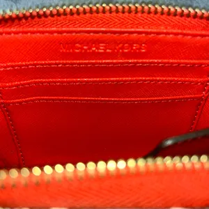 Michael Kors Vibrant Red/ Orange Wallet
GUC thumbnail 11