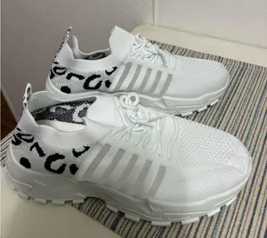White and Black Patterned slip on Sneakers NWOT Size 10 thumbnail 1