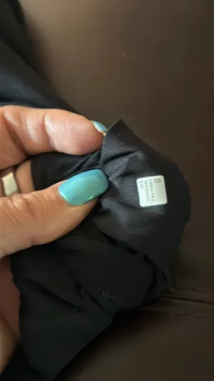 Lululemon The lighting isn’t the best but this is a black skirt with no fading and tag intact with no wrinkle thumbnail 8