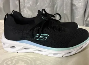 NWT- Skechers Women’s Black Knit Slip-On Sneakers with laces thumbnail 1