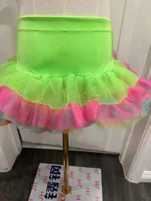 Neon green tutu skirt with pink, blue, and yellow ruffles. One size. Polyester thumbnail 2