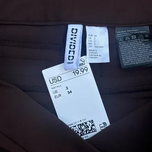 H&M brown flare mid-rise trousers. Size US 2. New with tags thumbnail 6