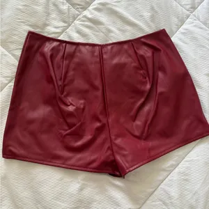 EGO Curved Waistband Shorts In Burgundy Faux Leather thumbnail 4