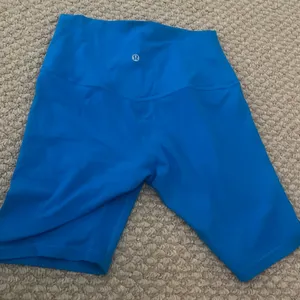 Size 6. 8 inch inseam Lululemon electric blue biker shorts. Only worn 2-3 times thumbnail 2