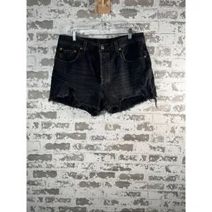 Levi’s | women black button fly denim shorts distressed thumbnail 9