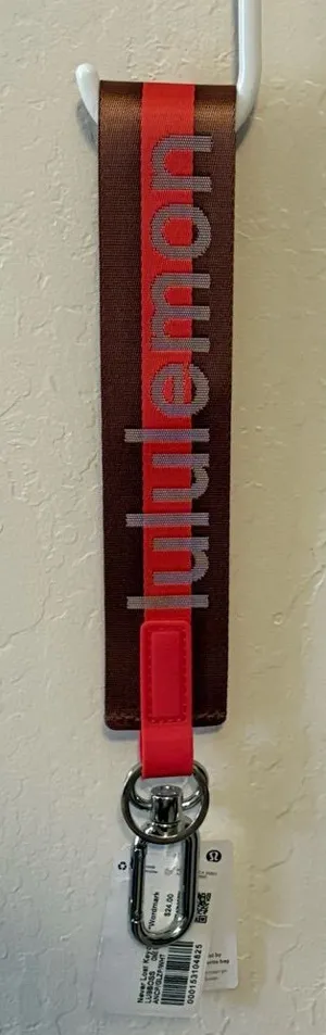 Lululemon Never Lost Keychain Word Mark NWT authentic ancp/glzp/wht thumbnail 1