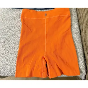 Free people movement orange shorts thumbnail 4