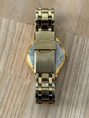 Seiko Vintage Watch Gold Bracelet Case White Dial Blue Gold Hands Date Window thumbnail 12