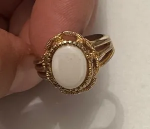 Gold-Tone Ring with White Oval Stone - Elegant Women's Jewelry thumbnail 1