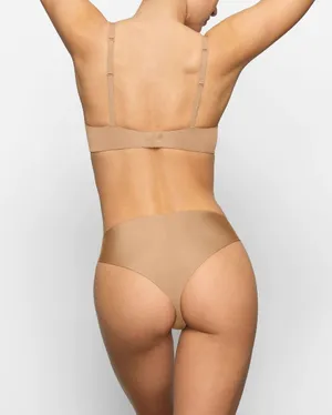 SKIMS WIRELESS FORM PUSH-UP PLUNGE BRA | OCHRE thumbnail 4