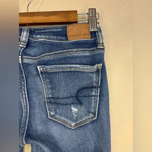 American Eagle Outfitters Distressed Ripped Blue Skinny Jeans Size 0 thumbnail 5