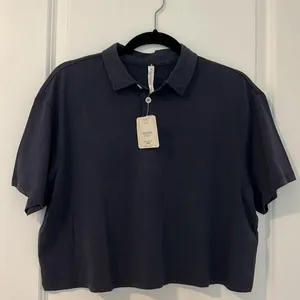 NWT Fabletics Classic Navy Boxy Short Sleeve Polo Shirt Size Medium Blokecore thumbnail 11