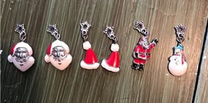 Avon Vintage Christmas Charm Bracelet Pieces Santas and Snowman thumbnail 1