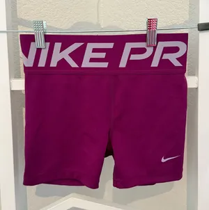 Nike Pro Women’s Dri-FIT Compression Shorts Magenta Pink Size Medium thumbnail 1